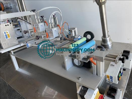 Herma H400 Semi automatic wrap labeller