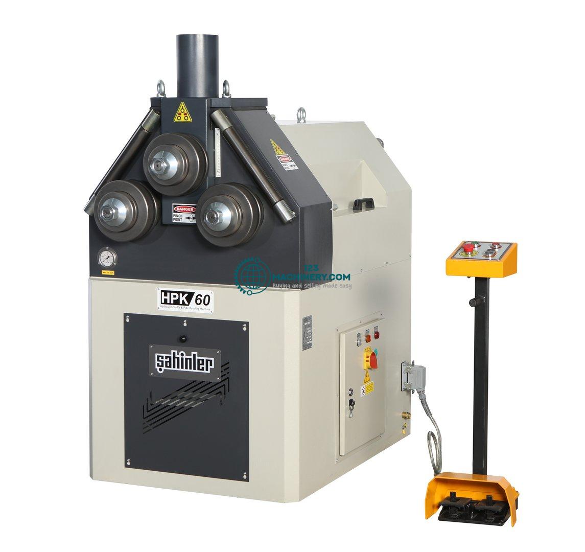 Profile bending machine with hydraulic feed of rol